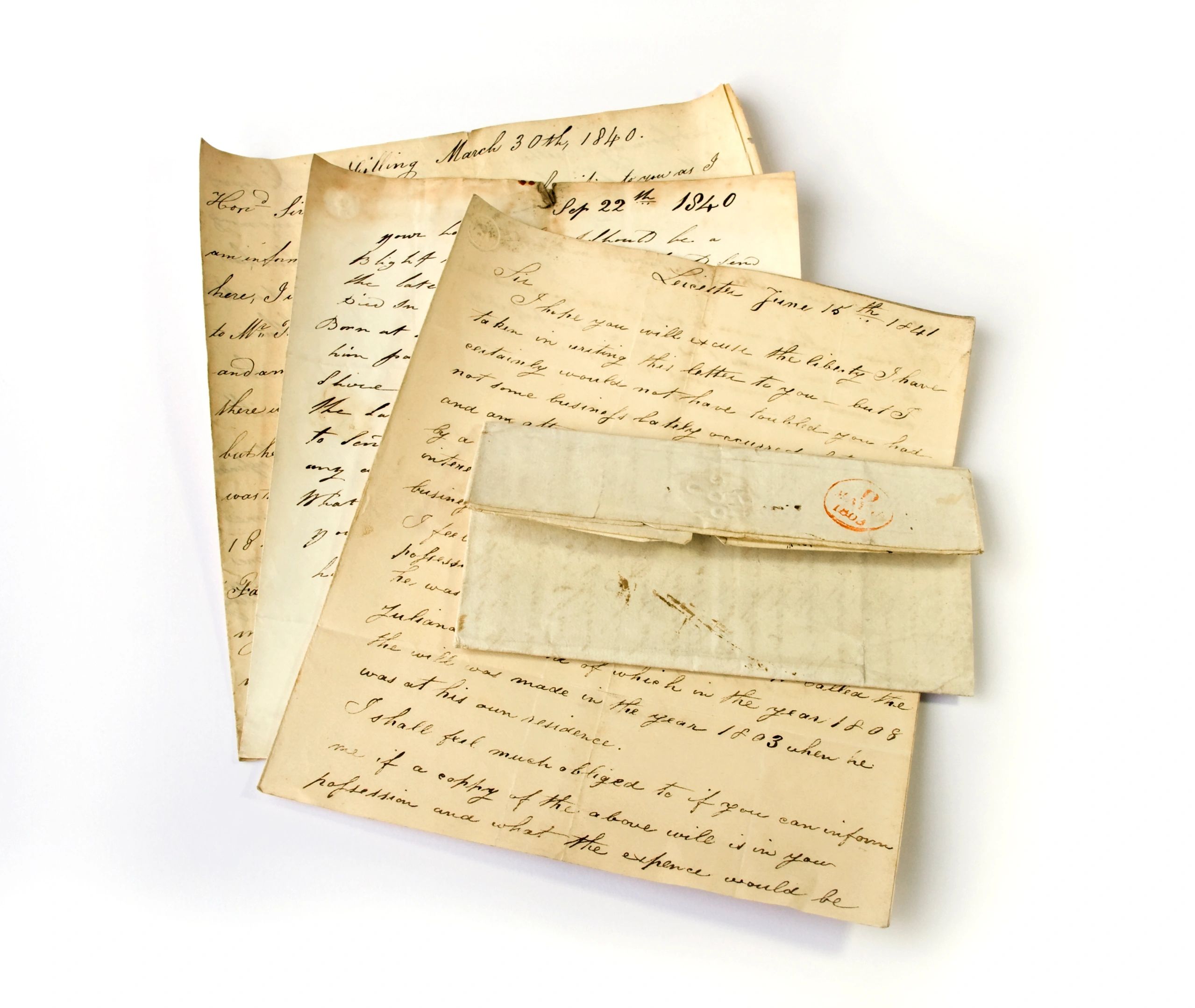 Vintage family documents laid out on a table