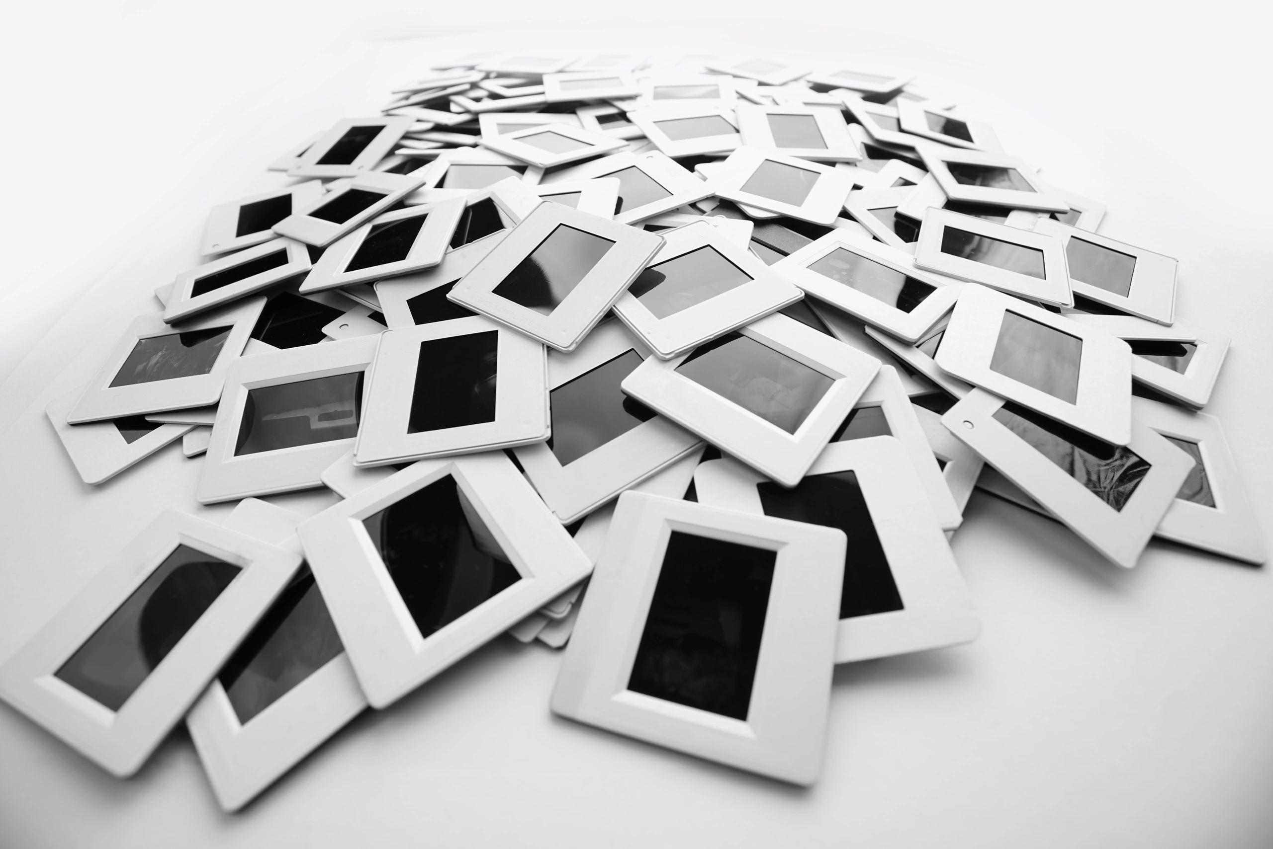A collection of photo slides on a white background